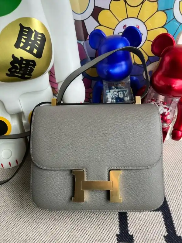 Discover timeless elegance with the Hermes Constance 18cm in soothing grey. A perfect companion for your stylish moments. 💖✨👜 https://tinyurl.com/2y6gasoz