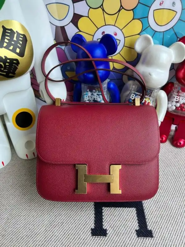 Discover the elegance of the Hermes Constance 24cm in radiant red. A timeless accessory to brighten your ensemble! ❤️✨👜 https://tinyurl.com/2476zpnk