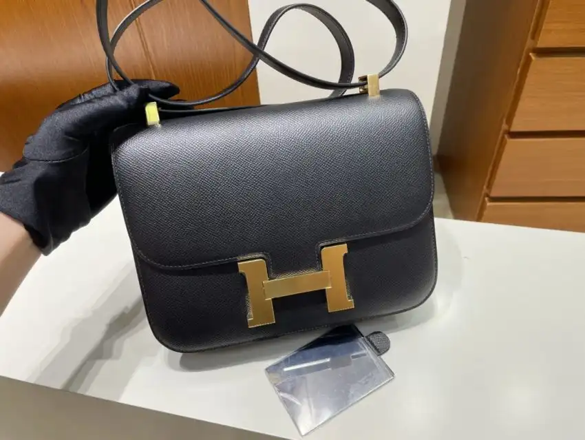 Discover the elegance of the Hermes Constance 24cm in timeless black. A perfect blend of style and sophistication awaits you. 🖤✨✨ https://tinyurl.com/2xjds443