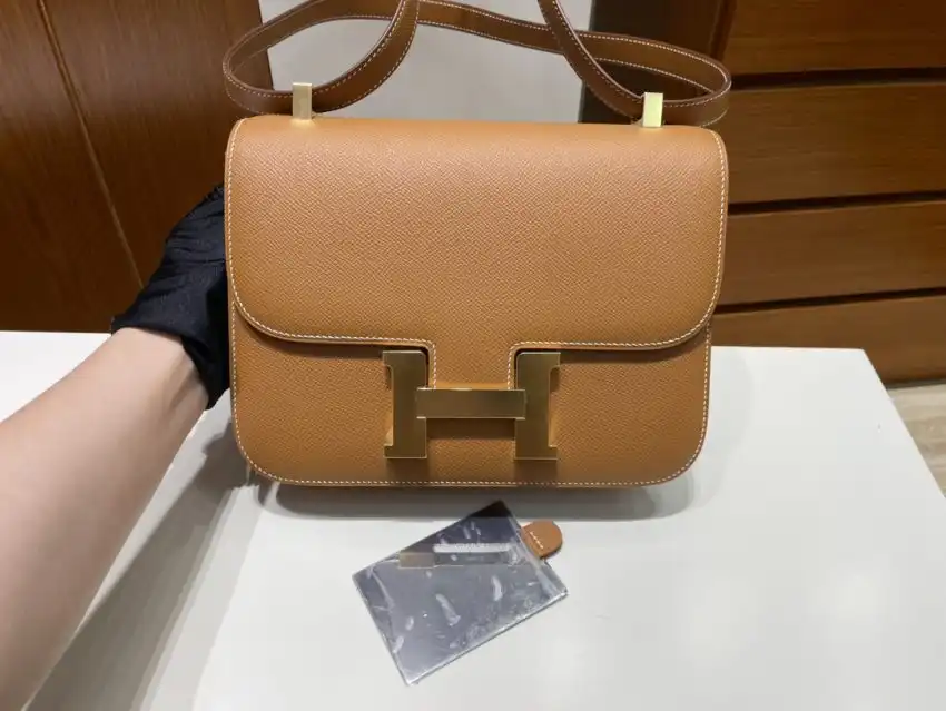 Discover the elegance of the Hermes Constance 24cm in Golden Brown. A timeless piece that radiates warmth and sophistication. 🌟👜✨ https://tinyurl.com/2dx24rqv