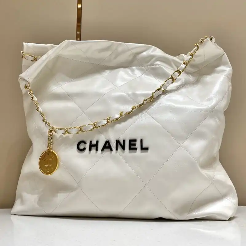 Discover elegance with the CHANEL 22 Small Handbag in white. A perfect companion for every occasion, radiating timeless charm. ✨🤍👜 https://tinyurl.com/279etx75