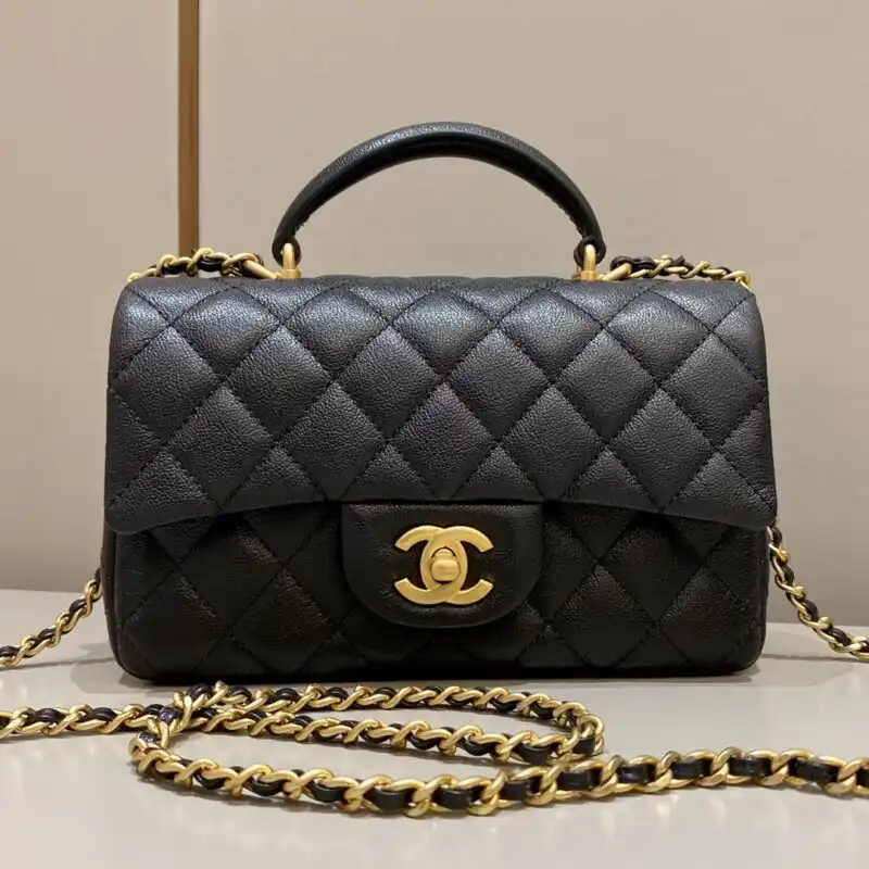 Discover the timeless elegance of the CHANEL CF Handle in classic black. A perfect companion for any occasion. ✨🖤✨ https://tinyurl.com/27hwkdsz