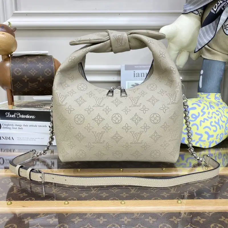 Introducing the Louis Vuitton Why Knot in Beige—a timeless piece that whispers elegance and charm. Elevate your style with love! 💖✨👜 https://tinyurl.com/2ykpre79