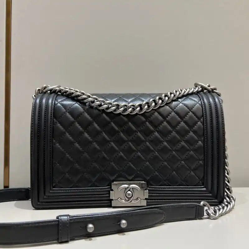 Discover the elegance of CHANEL Le Boy Large in Black and Silver. A timeless piece to cherish and adore. ✨🖤🥰 https://tinyurl.com/23blh4ql
