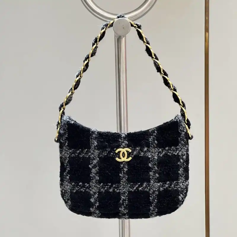 Discover the elegance of the CHANEL 22k Woolen Hobo—a perfect blend of luxury and comfort for your everyday adventures. 👜✨💖 https://tinyurl.com/26mnxd52