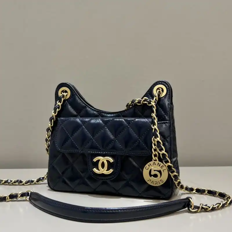 Discover the elegance of our CHANEL Hobo Small in dark blue. Perfect for any occasion, it’s a gentle touch of luxury. 💖👜✨ https://tinyurl.com/2cxl3m2b