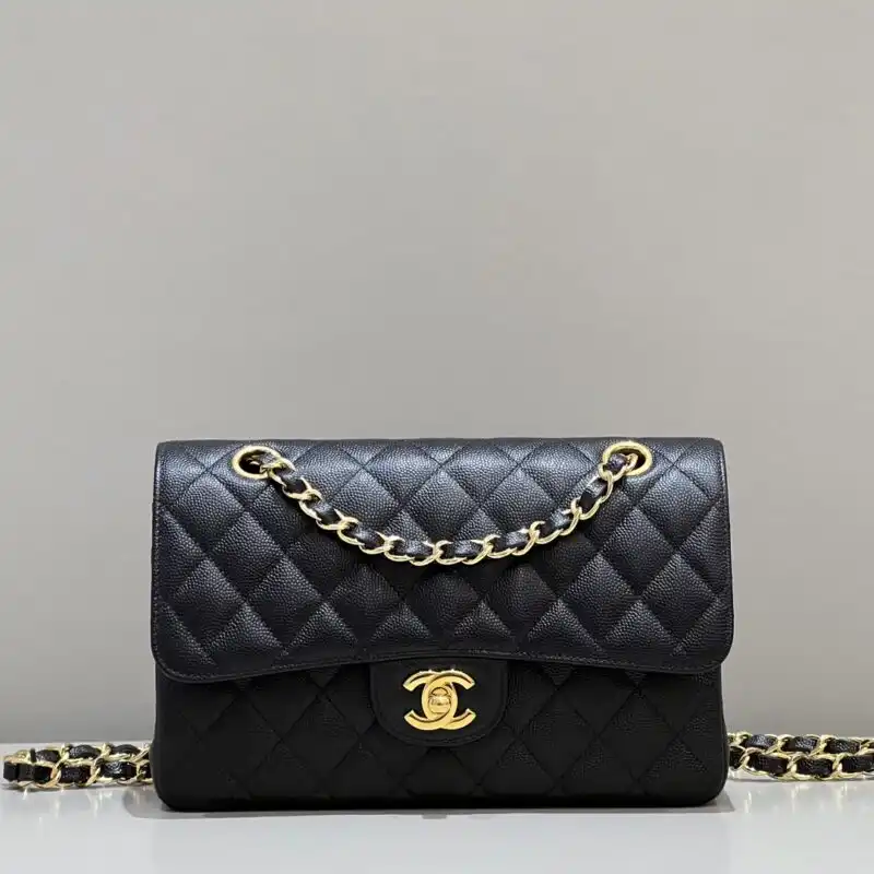 Embrace timeless elegance with the CHANEL Classic Flap in 23cm Black Caviar. A perfect companion for every occasion. 🖤✨👜 https://tinyurl.com/28tdv7hu