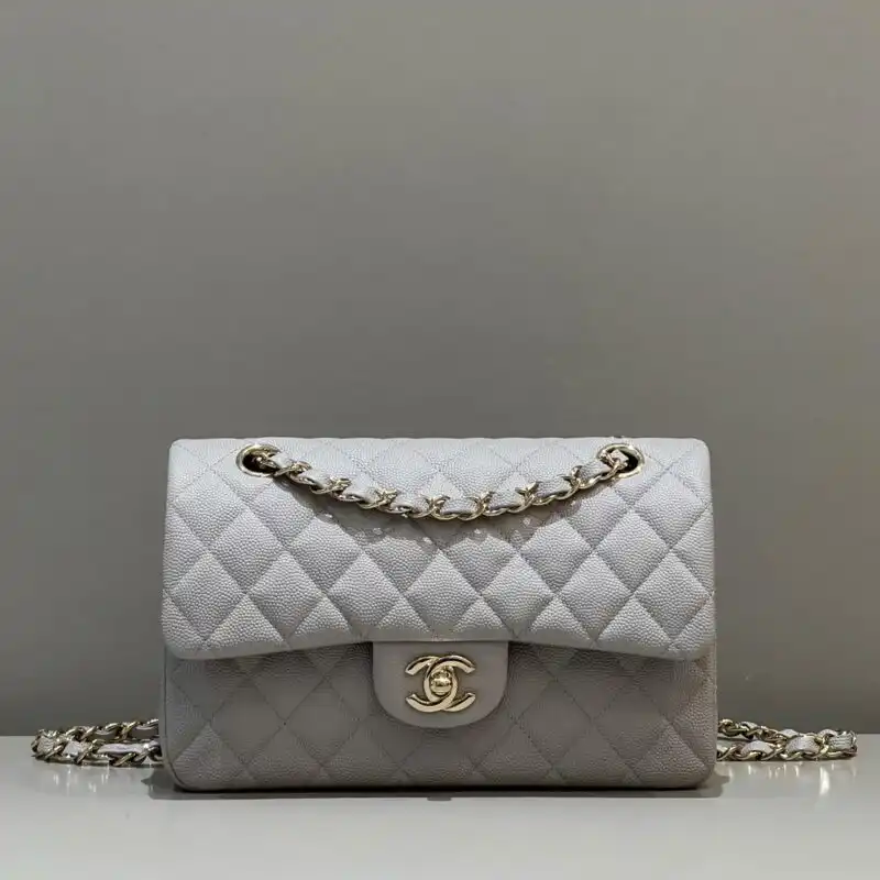 Discover the elegance of the CHANEL Classic Flap in soothing gray. A timeless piece to cherish and adore. 💖✨👜 https://tinyurl.com/27l85m53