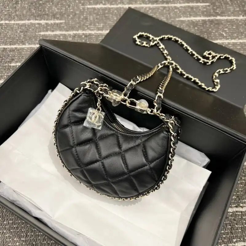 Discover the elegance of the CHANEL 23P Crescent Bag 🌙✨ A timeless accessory that adds a touch of charm to any outfit. 👜💕 https://tinyurl.com/2bhsrwos