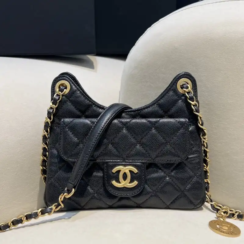 Discover the elegance of the CHANEL 23c Hobo Small in timeless black. A perfect blend of style and grace. 🖤✨👜 https://tinyurl.com/2b2qvp8w