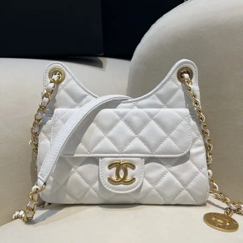 Discover the elegance of the CHANEL 23c Hobo Small in soft white. A charming companion for your daily adventures! 🤍✨👜 https://tinyurl.com/244p8scm
