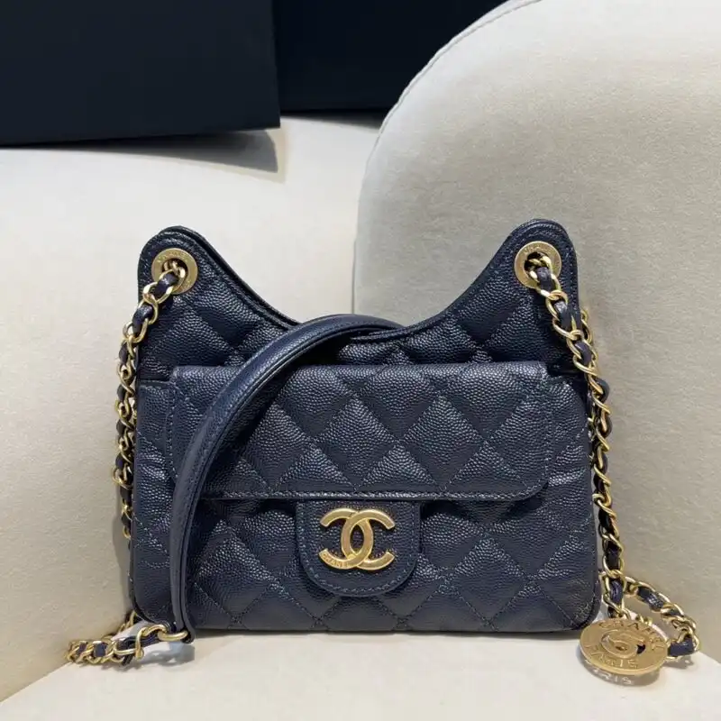 Discover the elegance of the CHANEL 23c Hobo Small in a serene dark blue. Perfect for adding charm to any outfit! 💙👜✨ https://tinyurl.com/26853y3d