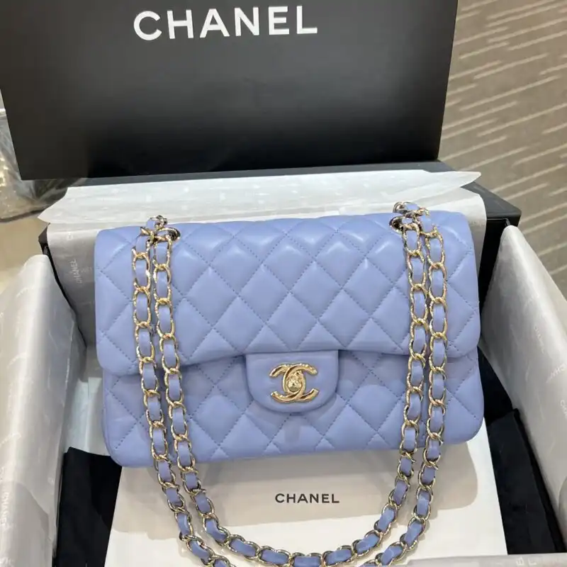 Discover the elegance of the CHANEL Classic Flap in soft light blue. A perfect companion for your timeless style. 💖✨👜 https://tinyurl.com/28vud32g