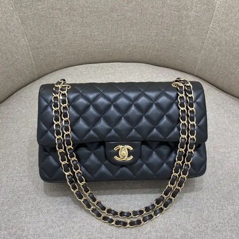 Discover the timeless elegance of the CHANEL Classic Flap 25cm in Black Gold. A perfect companion for any occasion. ✨🖤✨ https://tinyurl.com/2cjlyqvp
