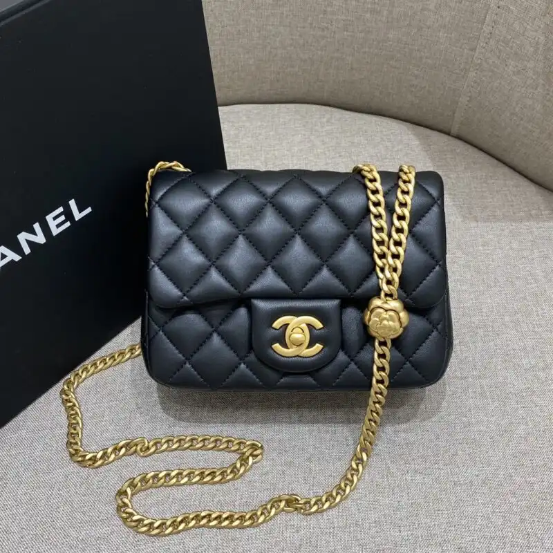 Discover the timeless elegance of the CHANEL Camellia Flap in black. A touch of luxury to brighten your day! 🌸🖤✨ https://tinyurl.com/2yq8hjbl