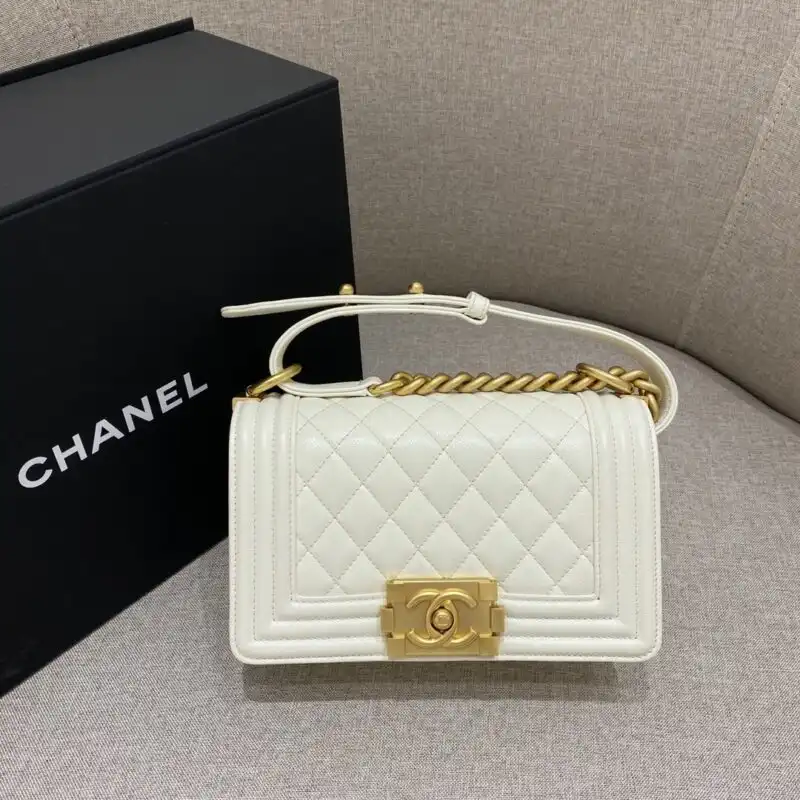 Discover the elegance of CHANEL Le Boy in pristine white. A timeless piece that embodies grace and sophistication. ✨🤍✨ https://tinyurl.com/24cvv2wn