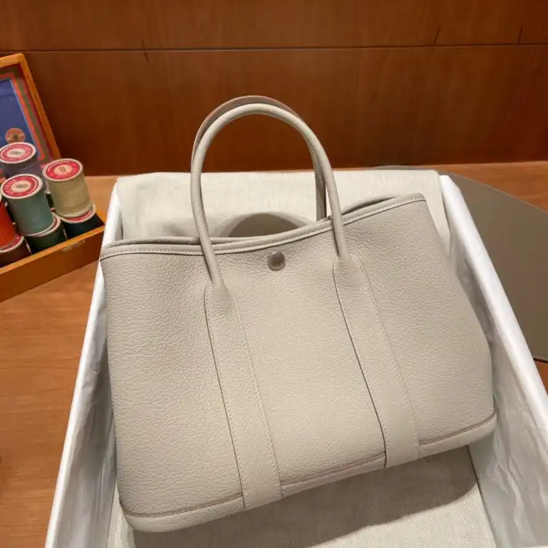 Introducing the exquisite Hermes Garden Party 30cm in Clacier White. A timeless companion for your style journey. 🌼✨👜 https://tinyurl.com/2d23botl