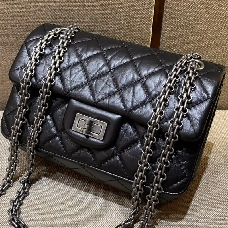 Discover the elegance of the CHANEL 2.55 Mini Bag in Black Silver. A timeless accessory to cherish forever. ✨🖤✨ https://tinyurl.com/25dtvzng
