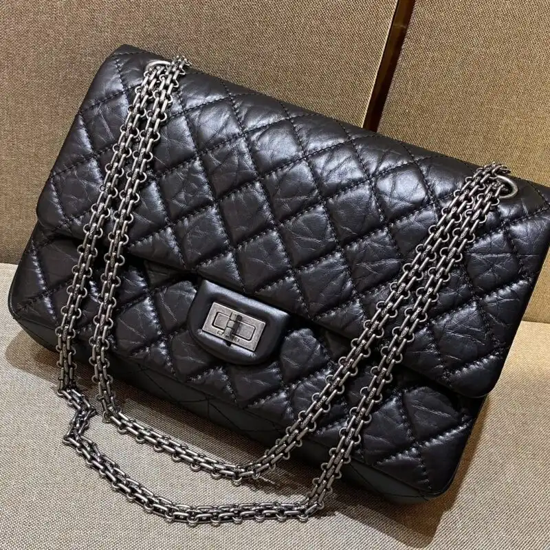 Discover the timeless elegance of the CHANEL 2.55 Bag in classic black and silver. A perfect companion for every occasion! 🖤✨💖 https://tinyurl.com/2dqhaxw5