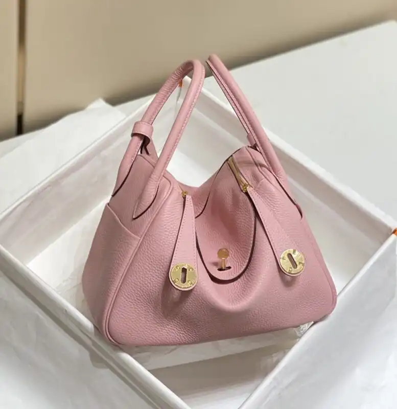 Discover the enchanting Hermes Lindy in a soft pink hue, perfect for adding a touch of elegance to your every day. 🌸👜✨ https://tinyurl.com/2377kpjm