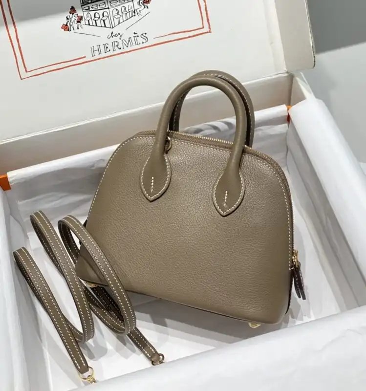 Discover the timeless elegance of the Hermes Mini Bolide in soothing Elephant Gray. A perfect companion for your everyday adventures! 👜✨🌟 https://tinyurl.com/229ua7lo