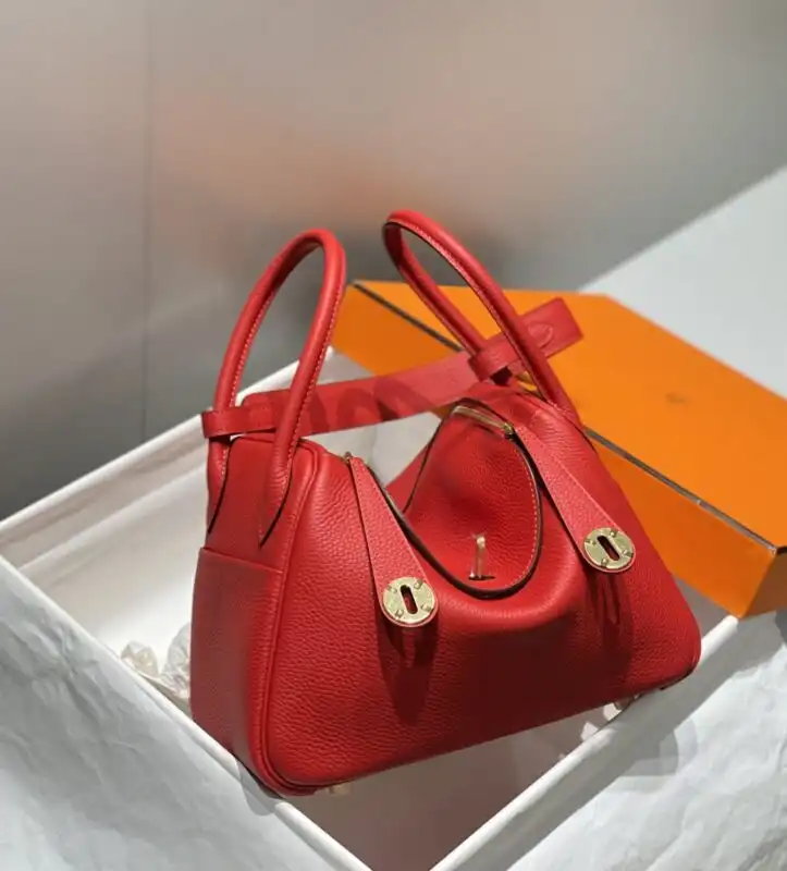 Introducing the exquisite Hermes Lindy in a vibrant red. A perfect blend of elegance and charm for your everyday adventures. ❤️✨👜 https://tinyurl.com/25dxc3as