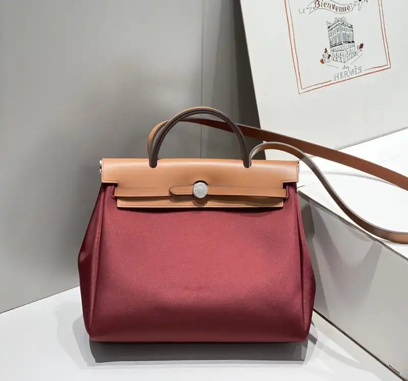 Discover the elegance of the Hermes Herbag 31cm in Bordeaux Red. A timeless companion for your stylish adventures! 🍷✨👜 https://tinyurl.com/2bh6mbbp
