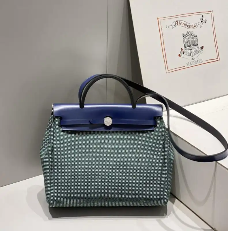 Discover elegance with the Hermes Herbag 31cm in soothing green. A perfect blend of style and functionality for your everyday adventures. 🌿✨👜 https://tinyurl.com/2yg8pn3r
