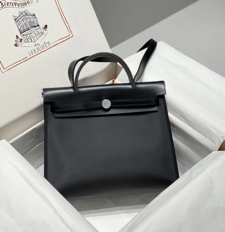 Introducing the elegant Hermes Herbag 31cm in timeless black. A perfect blend of style and versatility for your everyday adventures. 🖤✨👜 https://tinyurl.com/243w6lfm