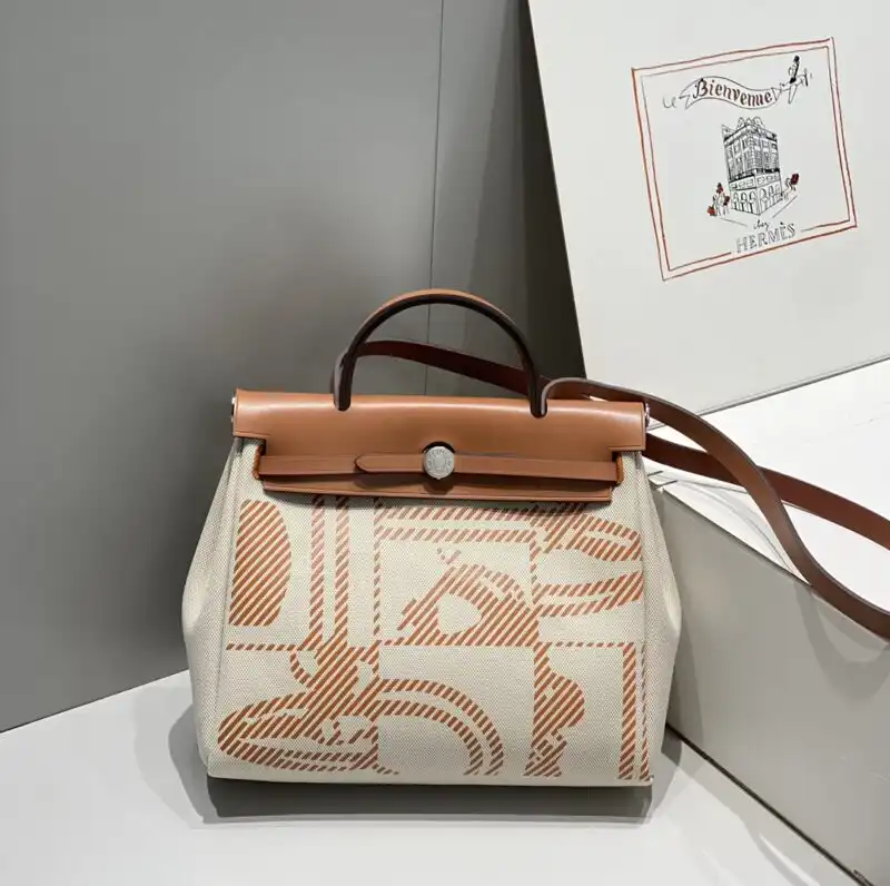 Discover the elegance of the Hermes Herbag 31cm in Manic Bride Brown. A timeless companion for your beautiful journey. 💖👜✨ https://tinyurl.com/283gyat4