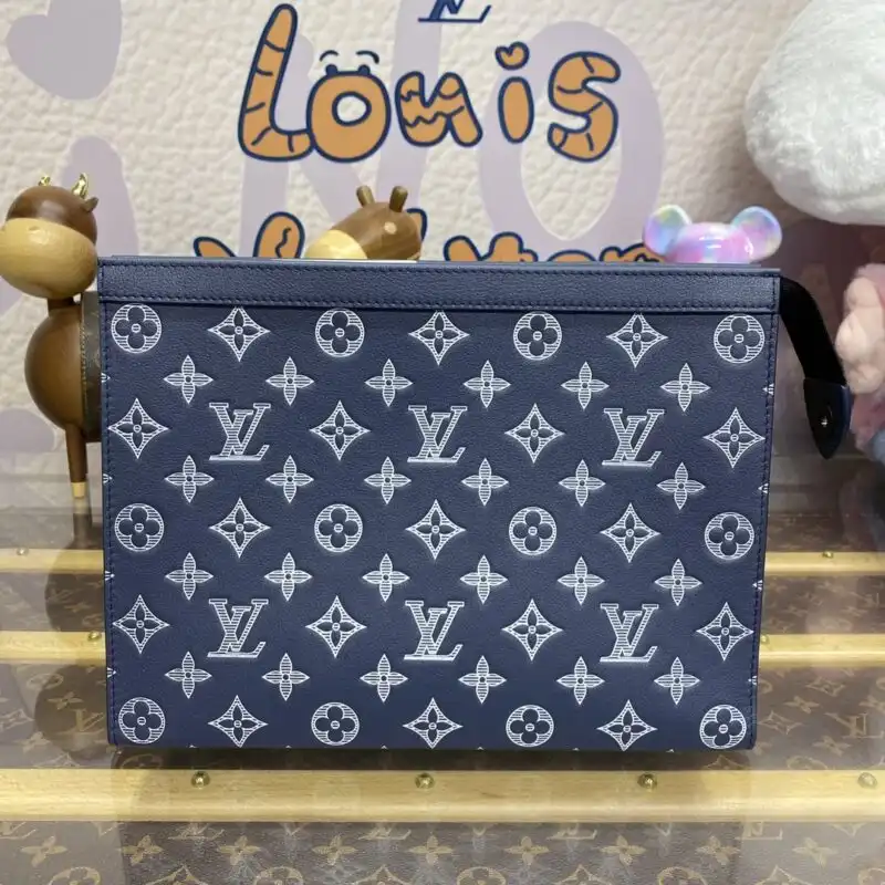 Discover elegance with the Louis Vuitton Pochette Voyage in dark blue 💙. A perfect blend of style and functionality for every occasion! ✨👜 https://tinyurl.com/27uyjuoo