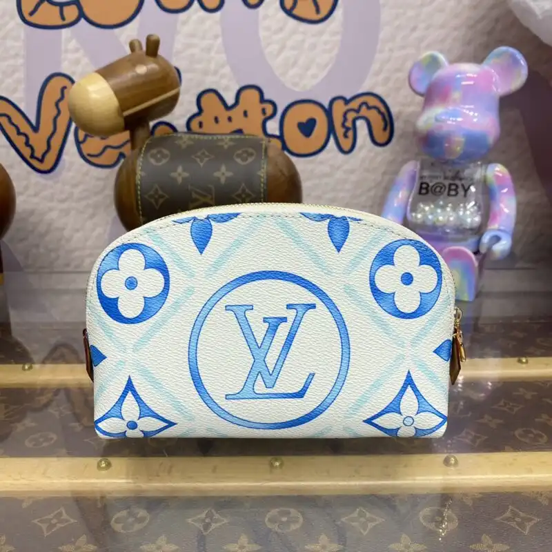 Discover the elegance of the Louis Vuitton Pochette Cosmétique in a serene blue hue. Perfect for your essentials, with love. 💙✨👜 https://tinyurl.com/26yltr8b