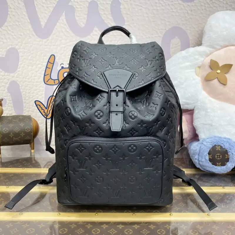 Discover the elegance of the Louis Vuitton Montsouris in classic black. A perfect companion for every adventure! 👜✨❤️ https://tinyurl.com/2cqb5pqu