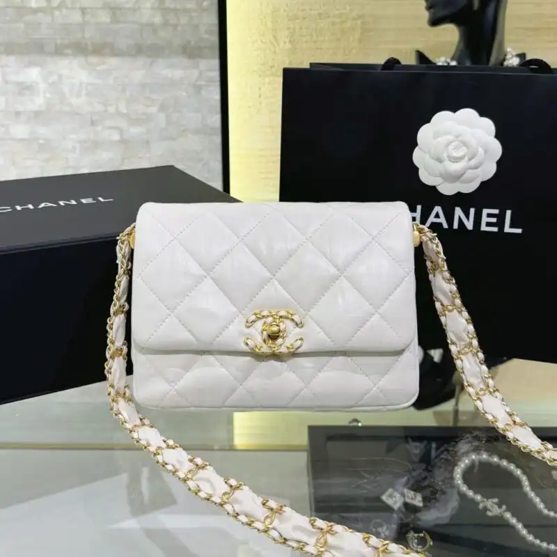 Discover elegance with the CHANEL 19 Mini Flap in white. A timeless accessory that adds a touch of grace to any outfit. ✨👜🤍 https://tinyurl.com/25vvzno3