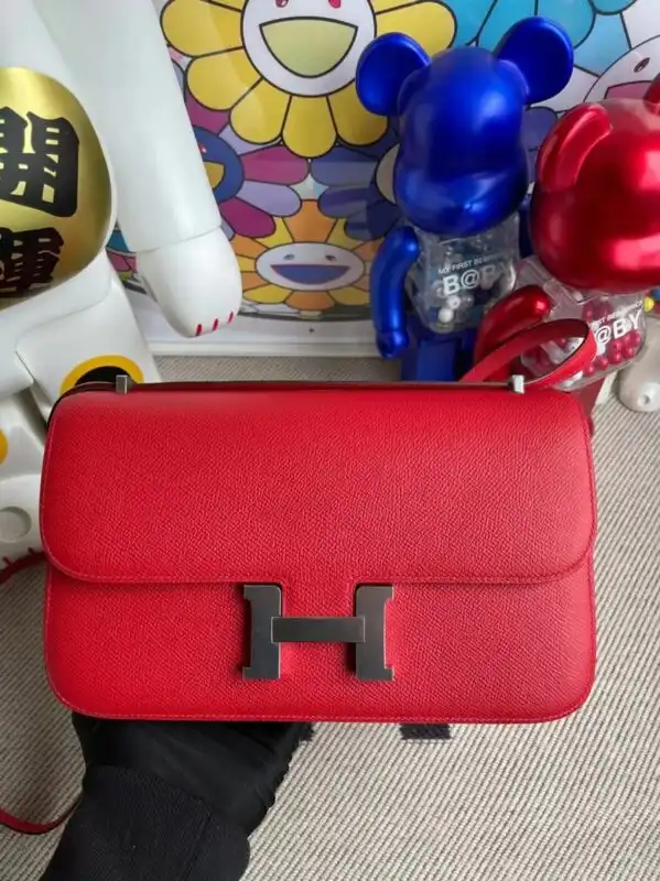Discover the timeless elegance of the Hermes Constance 26cm in radiant red. A perfect companion for every occasion! ❤️✨👜 https://tinyurl.com/2cu76lrw