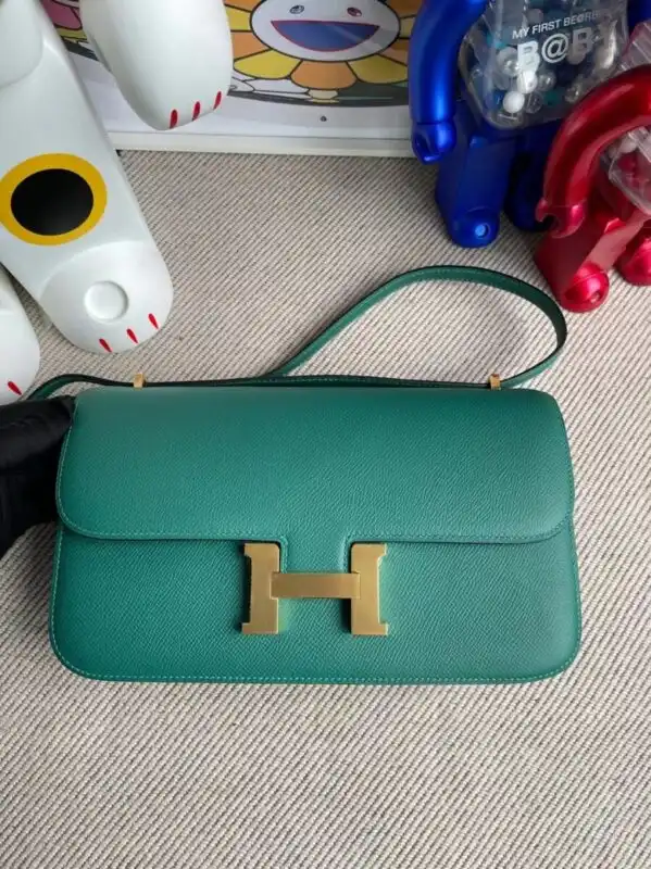 Discover the elegance of the Hermes Constance 26cm in a soothing green hue. Perfect for every occasion. 🌿✨💚 https://tinyurl.com/2cozdpgr