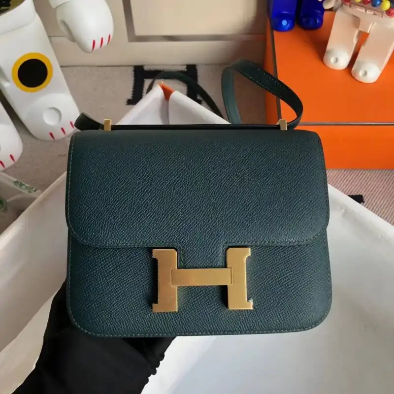 Discover the elegance of the Hermes Constance 18cm in Dark Green. A timeless addition to your collection, perfect for any occasion. 🍃✨💚 https://tinyurl.com/286ffa89
