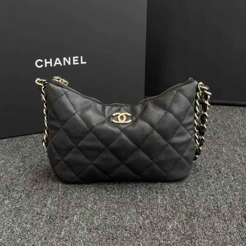 Discover the elegance of the CHANEL 24p Dumpling Bag in black. A timeless accessory that adds a touch of grace to any outfit. 🖤✨🌟 https://tinyurl.com/24mpk9k3
