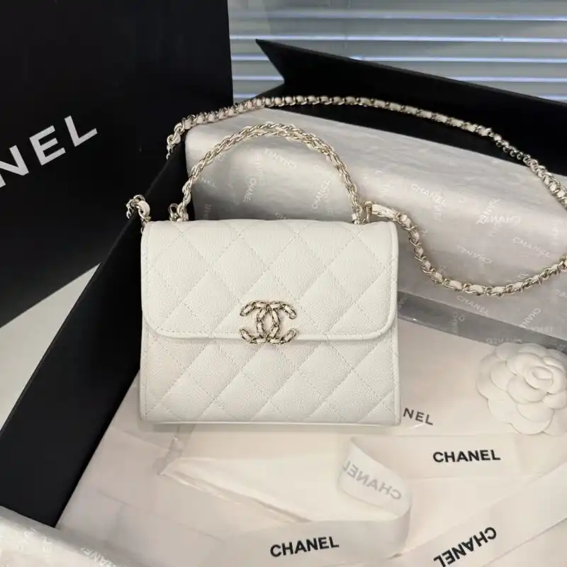 Discover the elegance of the CHANEL 23P Kelly Handle in soft white. A timeless piece that radiates grace and charm. ✨👜💖 https://tinyurl.com/259o4st4