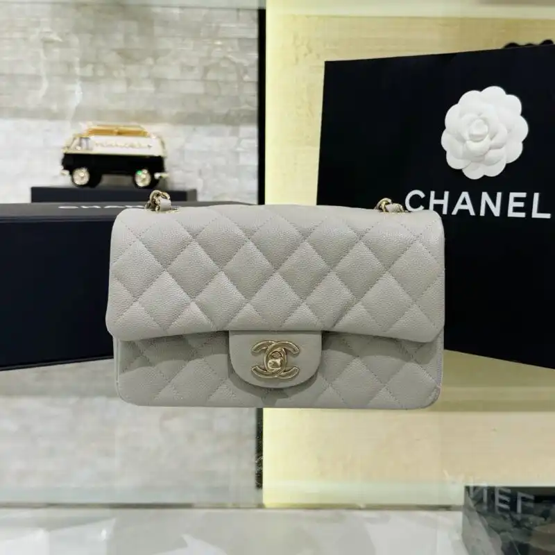 Discover the timeless elegance of the CHANEL Classic Flap 20cm in serene gray. A perfect companion for any occasion. 💖✨👜 https://tinyurl.com/2c6xcede