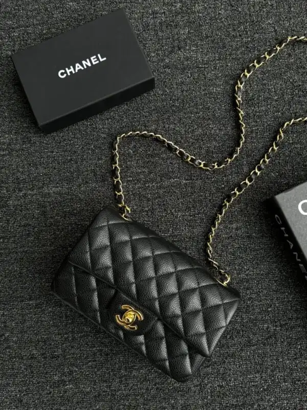 Discover the timeless elegance of the CHANEL Classic Flap 20cm in luxurious black caviar. A true treasure for your collection! 🖤✨👜 https://tinyurl.com/2cnt495l