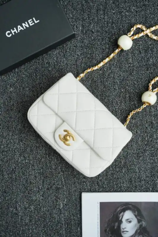Discover the timeless elegance of the CHANEL CF Double Pearl in White. A delicate touch for any occasion. ✨🌸💖 https://tinyurl.com/2yacc4xx