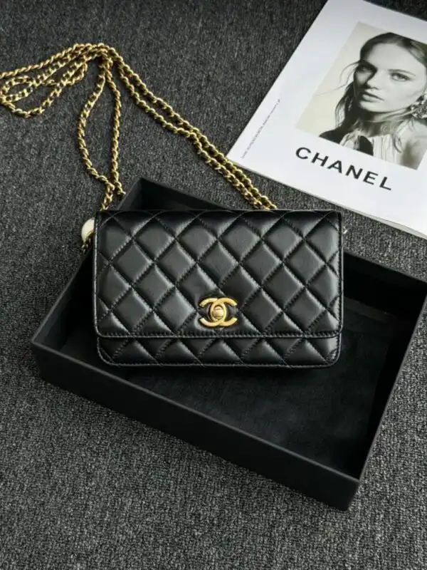 Discover elegance with the CHANEL 24s Double Pearl Woc in classic black. A timeless accessory that adds a touch of grace to any outfit. ✨🖤💖 https://tinyurl.com/2dbvuyf2