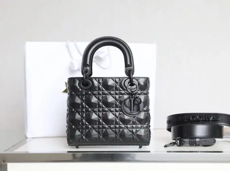 Discover the elegance of the Lady Dior Ultramatte Black Grid. A timeless piece that adds a touch of luxury to your style. 🖤✨👜 https://tinyurl.com/23mgnqol