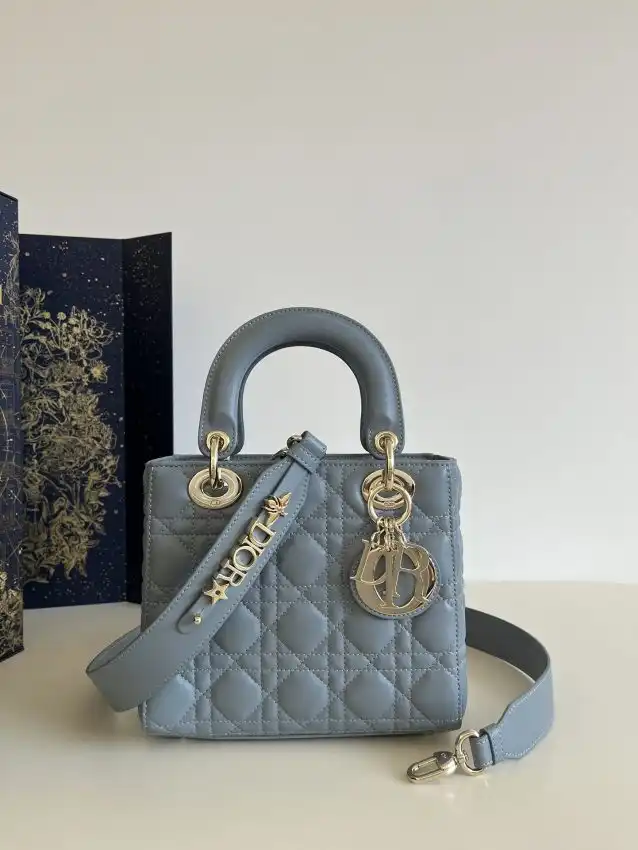 Embrace elegance with the Dior Lady Dior Blue ABC 💙✨ A timeless piece that adds a touch of charm to your style. 👜💖 https://tinyurl.com/25aljjfe