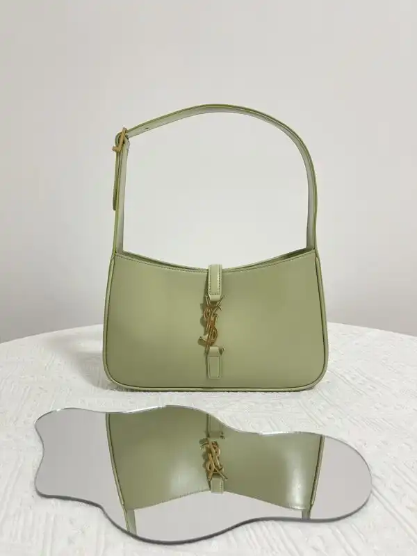 Discover the elegance of the YSL LE 5 A 7 Hobo in calming olive. A perfect companion for every occasion! 🍃✨👜 https://tinyurl.com/28k72eyj