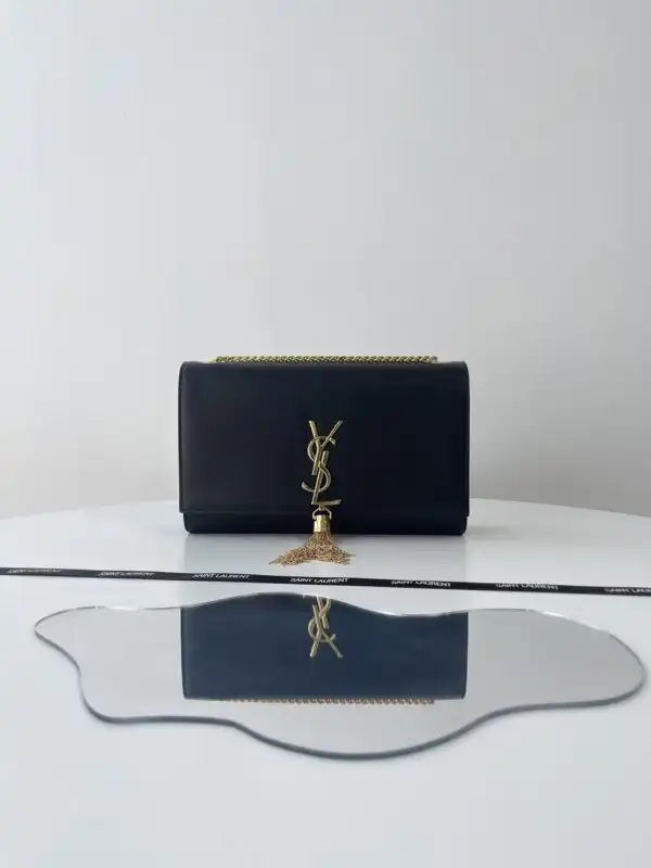 Discover elegance with the YSL Kate Tassel in timeless black. A perfect blend of style and grace for every occasion. ✨🖤💫 https://tinyurl.com/23hfo4x8