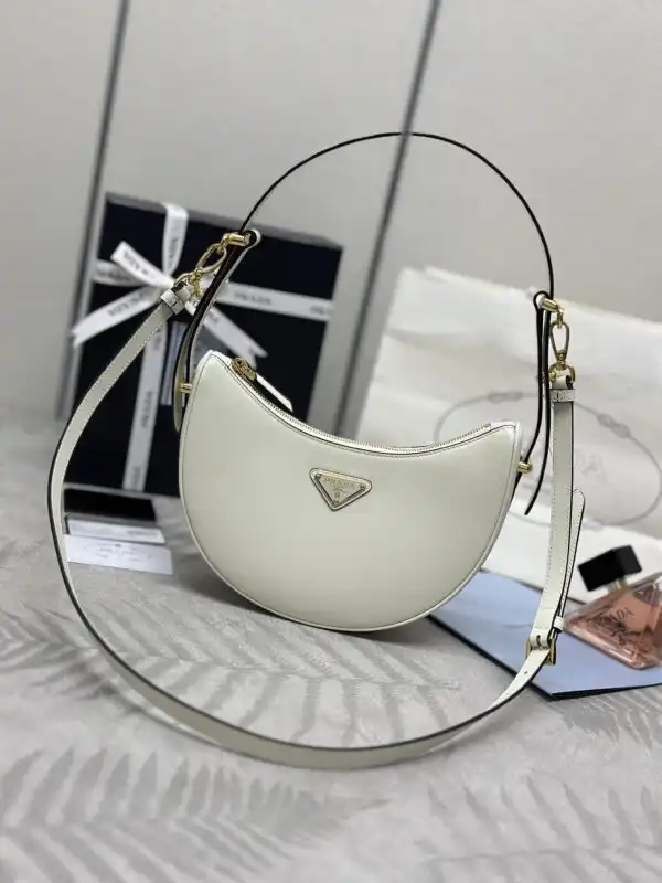 Discover the elegance of Prada Arque in soft white 🌸✨. A perfect blend of style and comfort, just for you! 💖 https://tinyurl.com/2y7upa2s