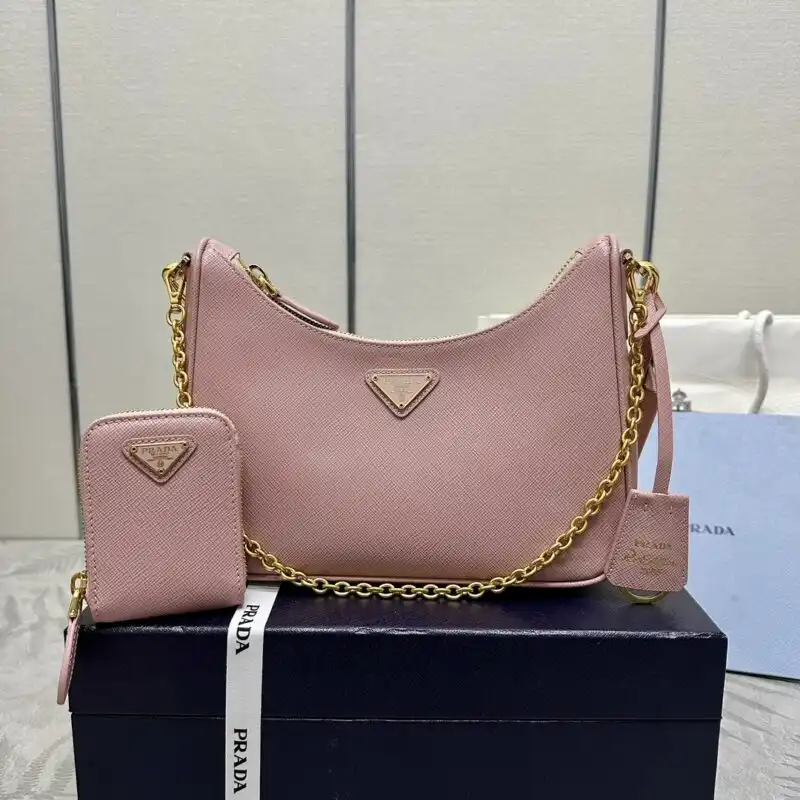 Introducing the Prada Re-Edition 2005 in lovely pink! 🌸✨ A timeless piece that brings joy and elegance to your wardrobe. 💖🌟 https://tinyurl.com/26ynyfst