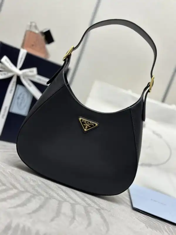 Discover the elegance of the Prada Cleo Medium in classic black. A timeless piece for your collection, perfect for any occasion. ✨🖤👜 https://tinyurl.com/2cxpk6ua